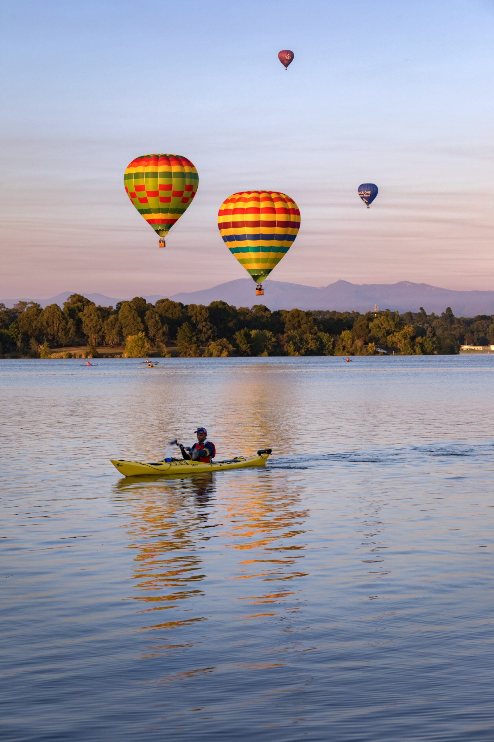 hot air balloons over lake burley griffin